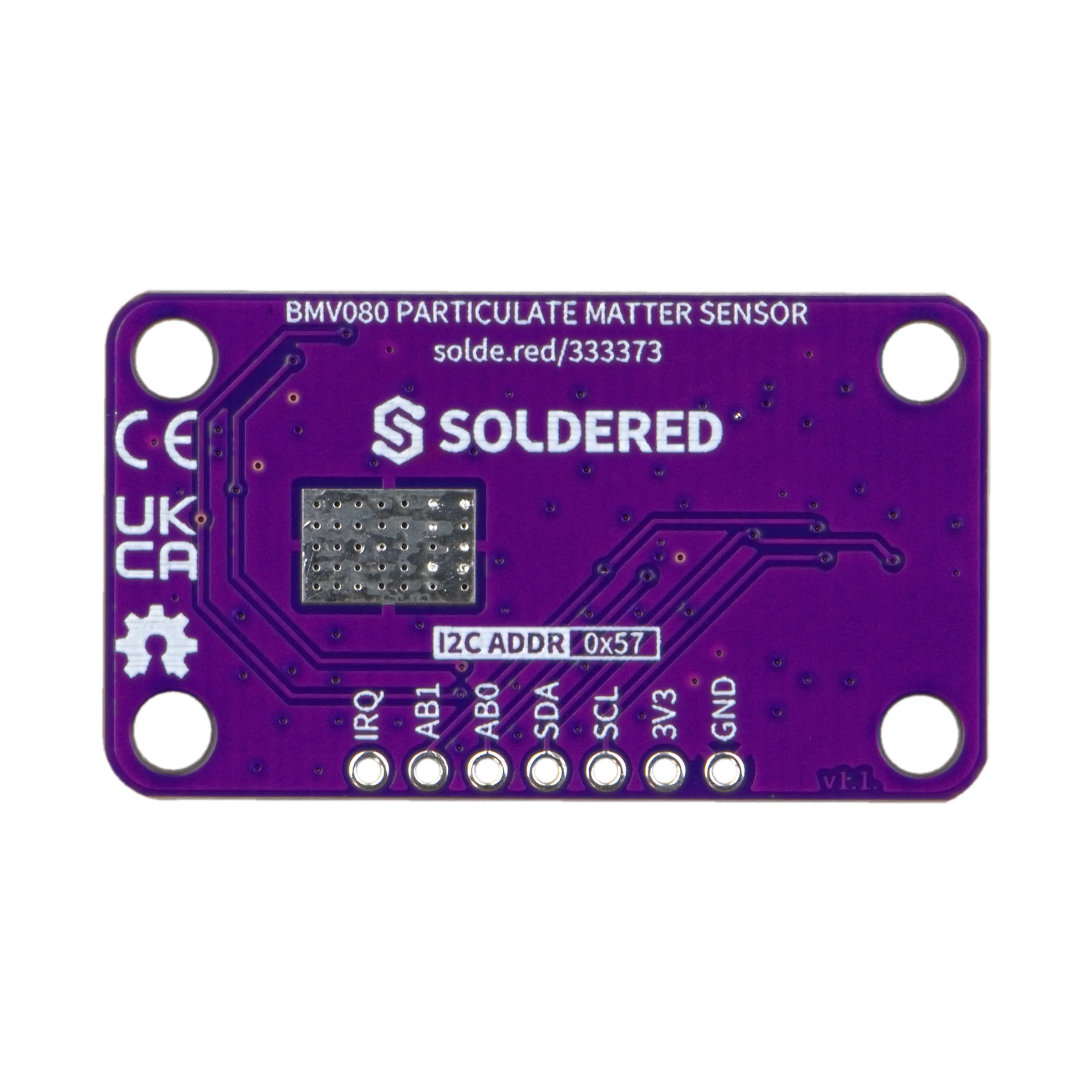 Underside of the purple board, with a mounting hole in each corner